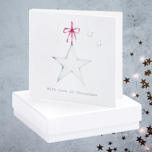 christmas star card with silver star earrings